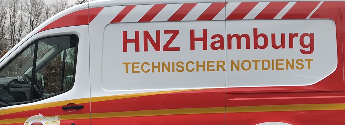 Fahrzeugbeschriftung Hamburg – HNZ Notdienst Transporter mit roter und gelber Folierung von Folien Fischer, professionelle Fahrzeugwerbung in Bergedorf, Reinbek, Glinde, Geesthacht und Wentorf