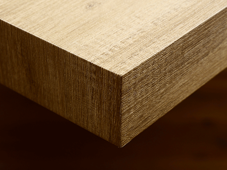 Holzoberfläche mit Möbelfolie beklebt – hochwertige Folierung von Möbeln durch Folien Fischer Hamburg